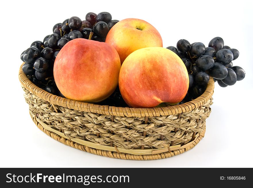 Fruits in woodem lug-box on white background