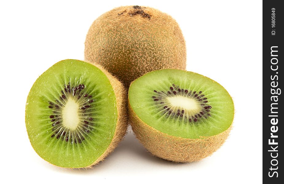 Kiwis, whole and slices on a white background. Kiwis, whole and slices on a white background