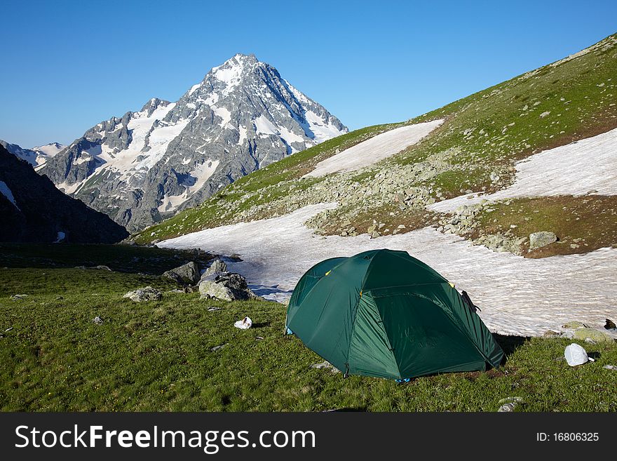 Mountaneers tent on meadow in the mpuntains. Mountaneers tent on meadow in the mpuntains