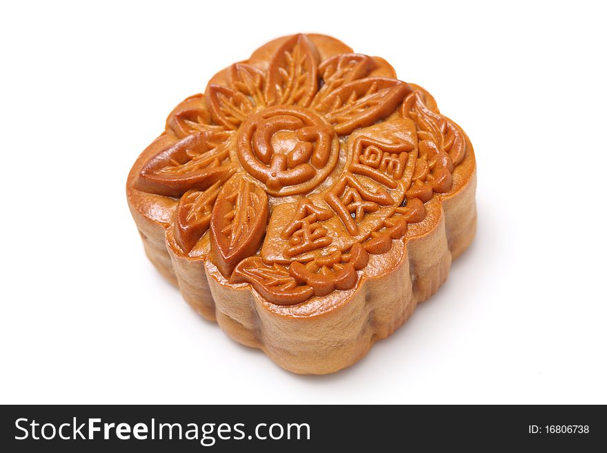 Close up of a mooncake isolated over white background.