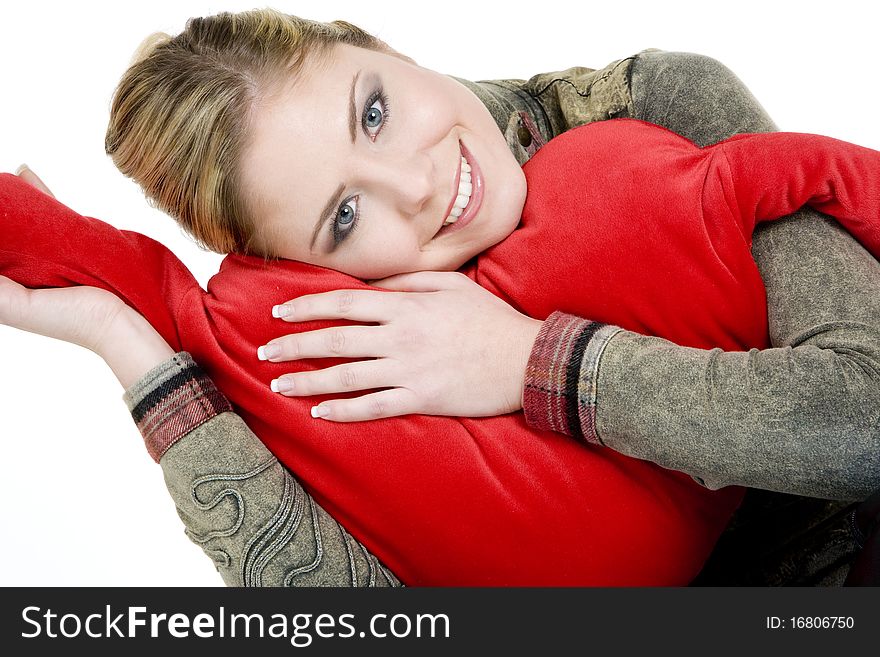 Portrait of woman holding a heart