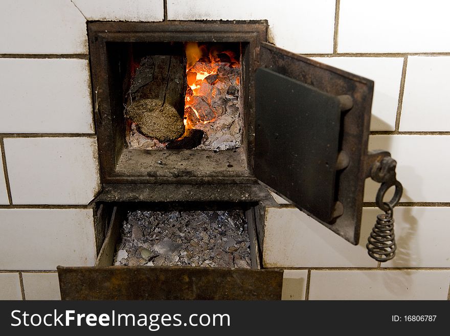 Close up of stove with fire