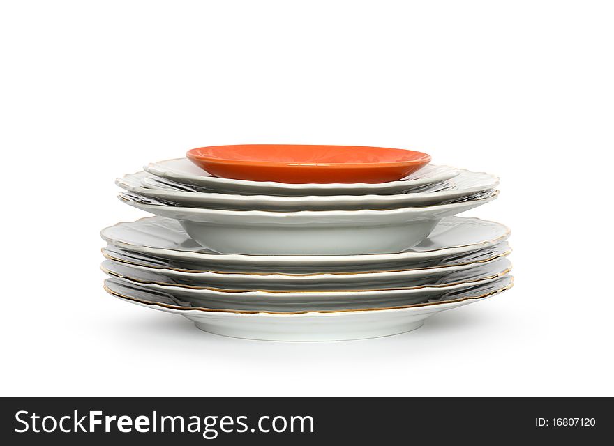 Stack of clean plates isolated on white background with clipping path. Stack of clean plates isolated on white background with clipping path