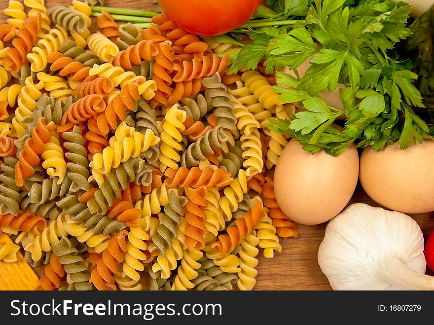 Close up of basic ingredients for italian pasta. White background. Close up of basic ingredients for italian pasta. White background