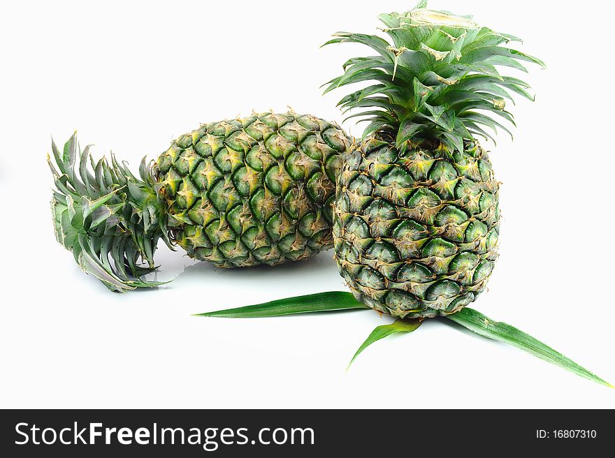 Two Pineapple Isolated on White.