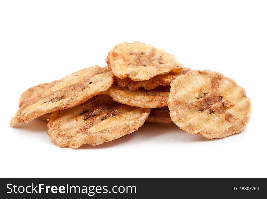 Banana slices in caramel isolated on white background