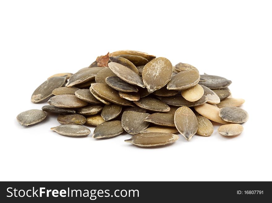 Pumpkin seeds isolated on white background