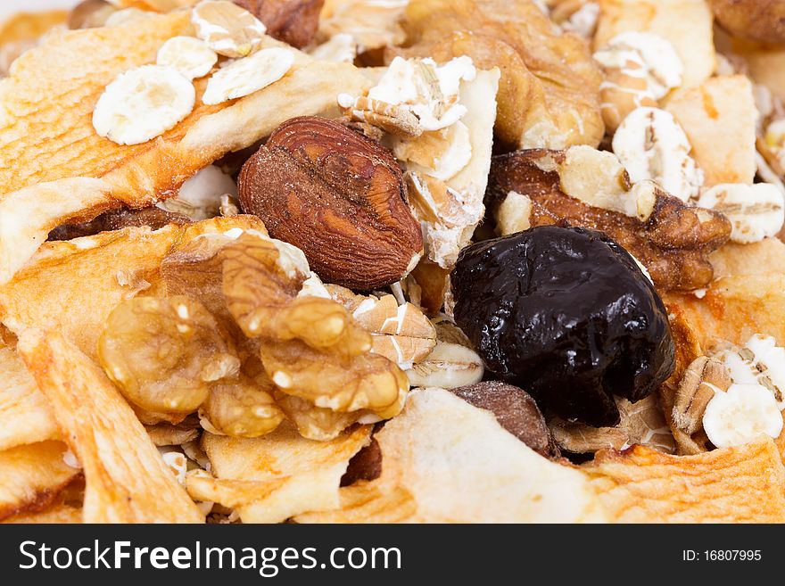 Muesli mix with nuts and plums closeup