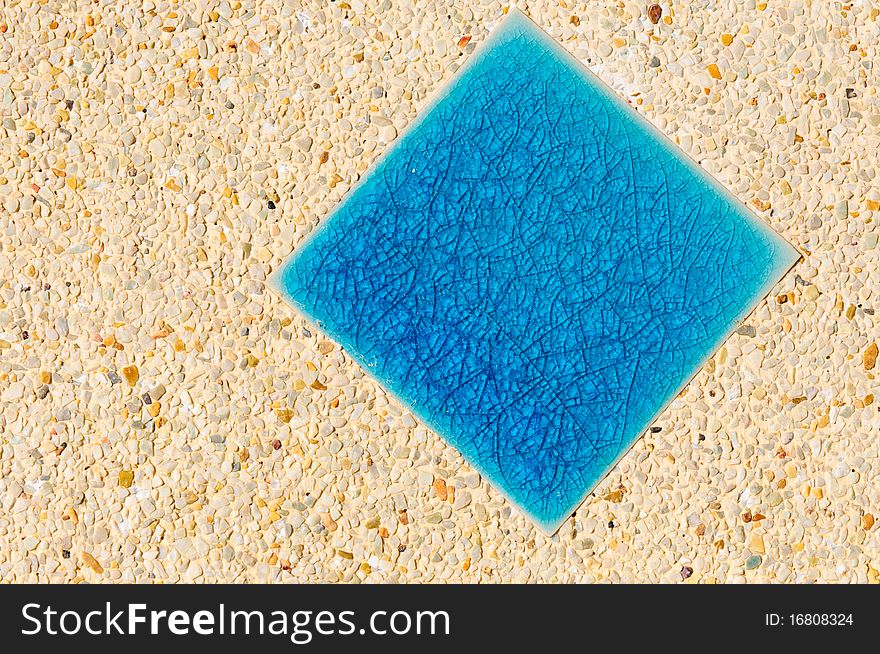 Blue tiles with brown background in pool