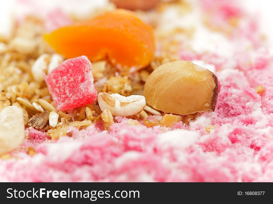 Muesli with ice cream closeup