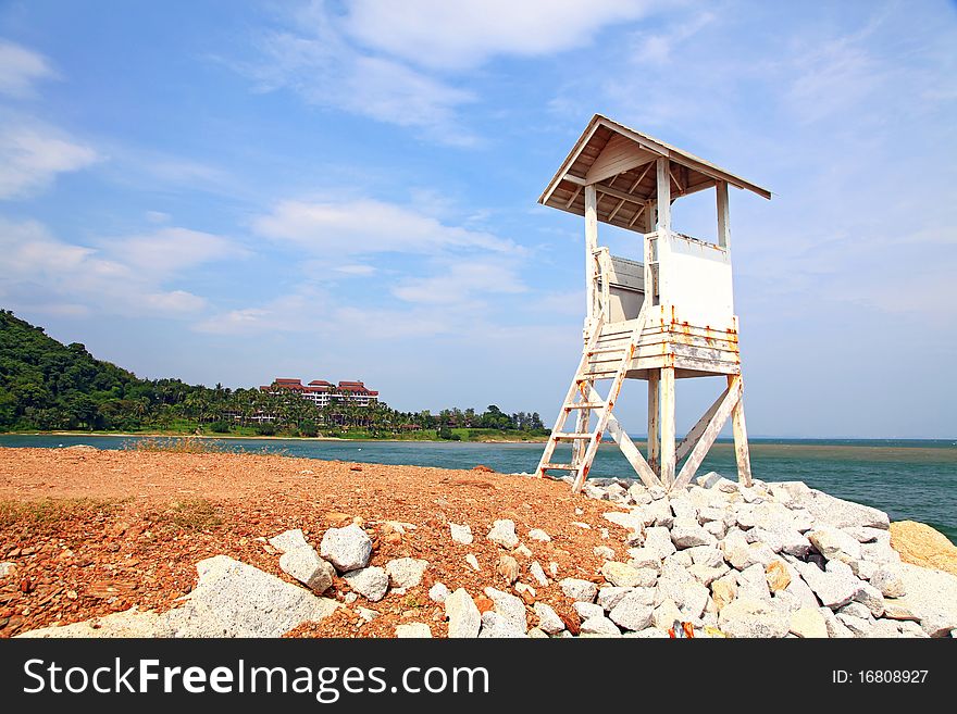 Beach life guard tower on dry meadow at Rayong beach in Thailand