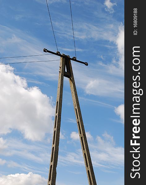 High voltage power line on the blue sky