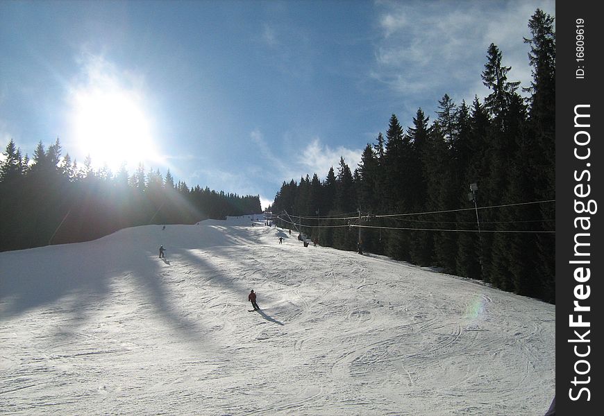 Nice hillview with white snow and skiiers in Slovakia. Nice hillview with white snow and skiiers in Slovakia