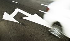 White Arrow Sign On Road Royalty Free Stock Photography White Arrow Sign On Road Royalty Free Stock Photography