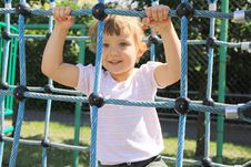 Four Year Old Girl On The Playground Stock Photos