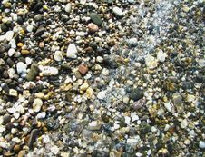 Background.Pebble On A Beach In Sea Water Stock Images Background.Pebble On A Beach In Sea Water Stock Images