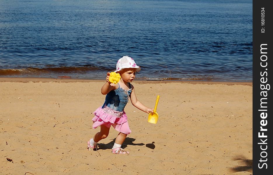 Baby Girl Run On The Beach