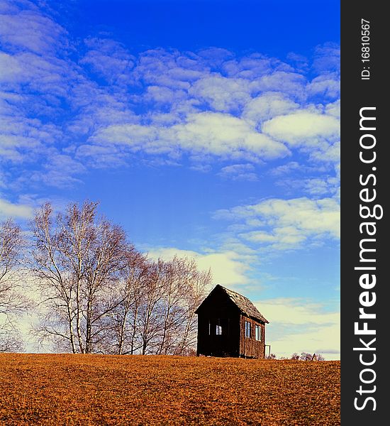 There is log cabin under the blue sky in China