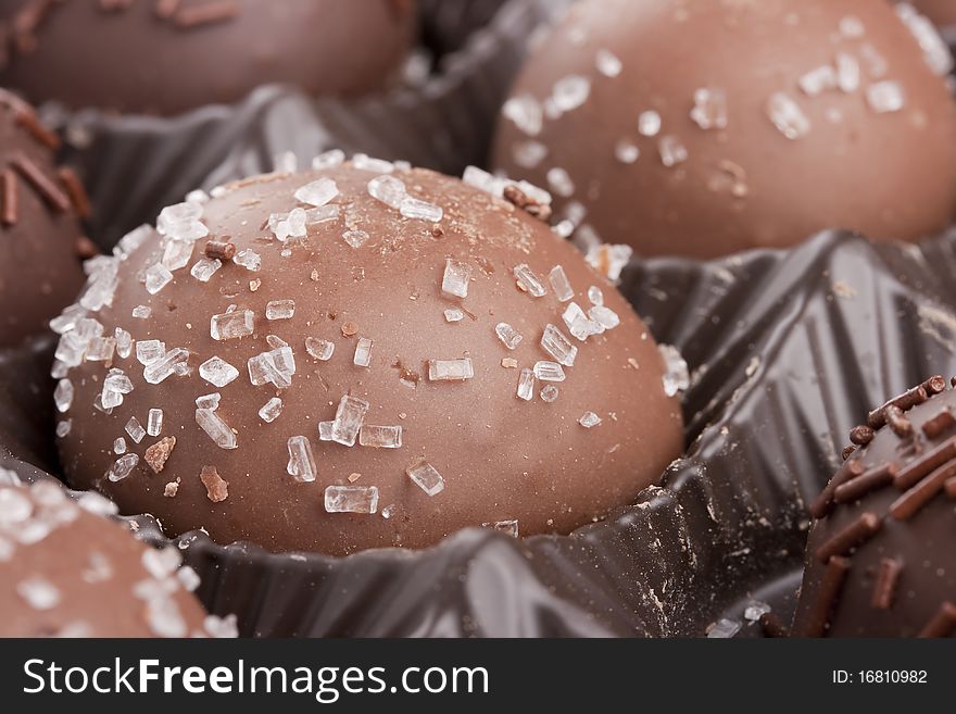 Truffle candy coated chocolate with decorative powdered for the occasion.