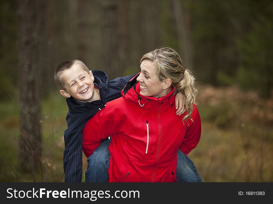 Mother and her son in the forest. Mother and her son in the forest