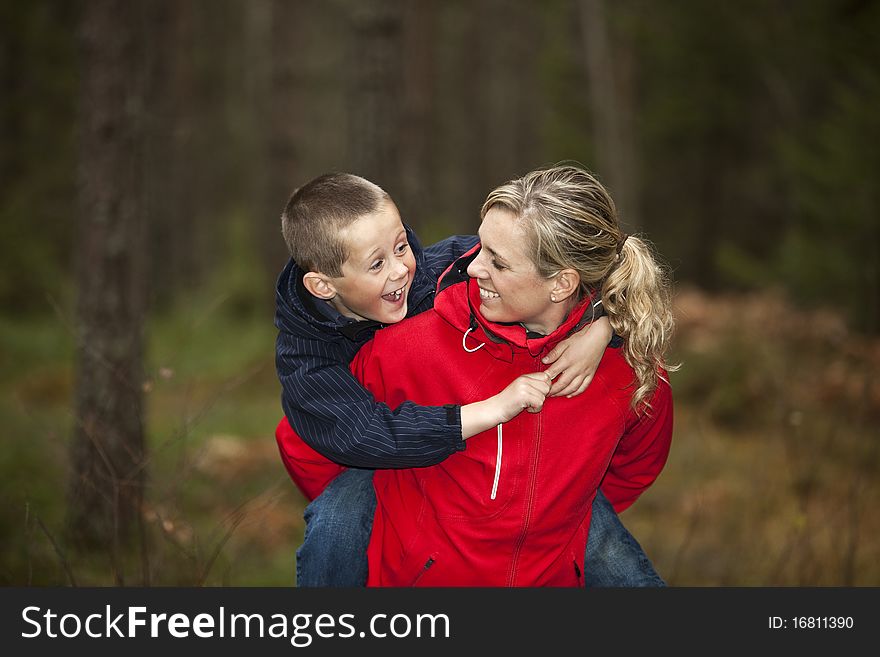 Mother and her son in the forest. Mother and her son in the forest