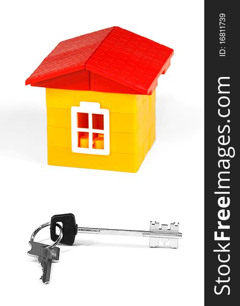 Toy, children's house and set of keys. Concept. Toy, children's house and set of keys. Concept