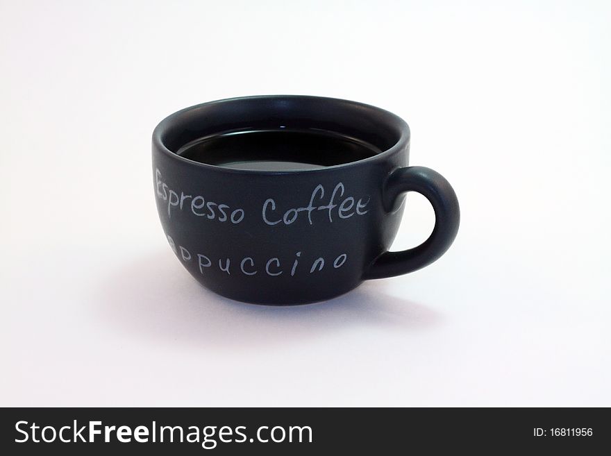 Dark blue cup of coffee isolated on a white background