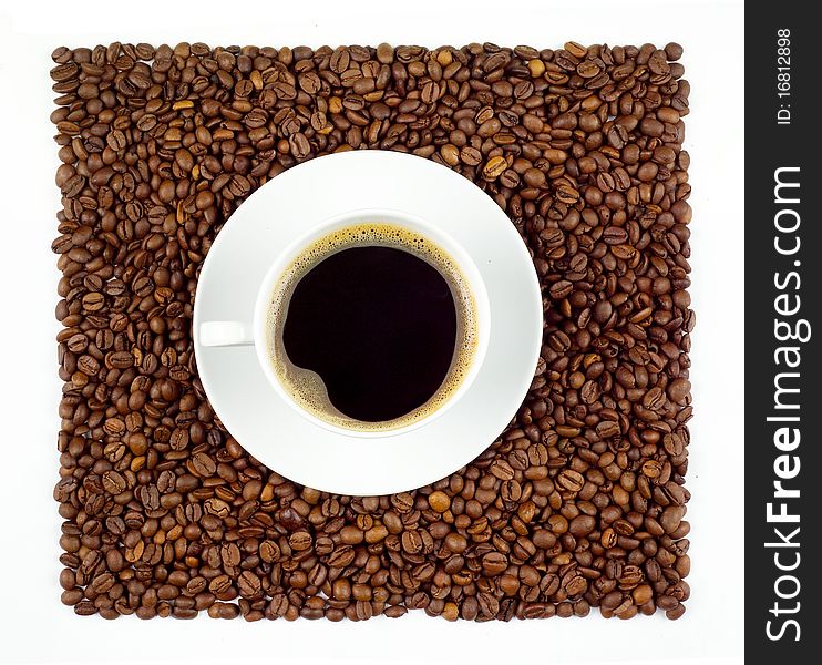 Cup Of Coffee On Beans