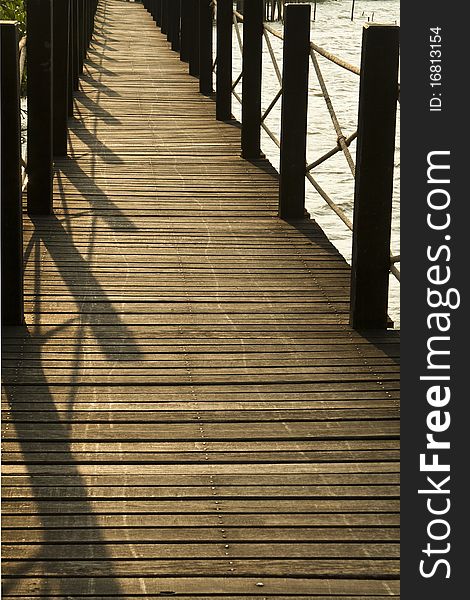 Wooden bridge walkway through the coppice