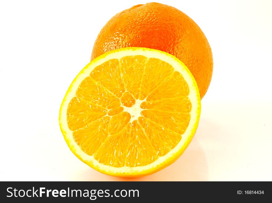 Sliced orange and a white background