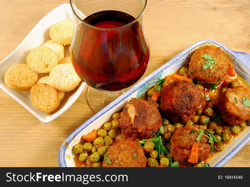 Croutons With Meatballs In Tomato Sauce With Peas