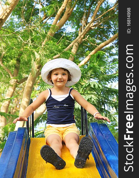 Little Girl On Slide