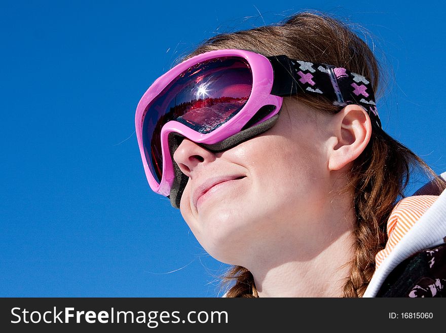 Girl smiling with ski mask