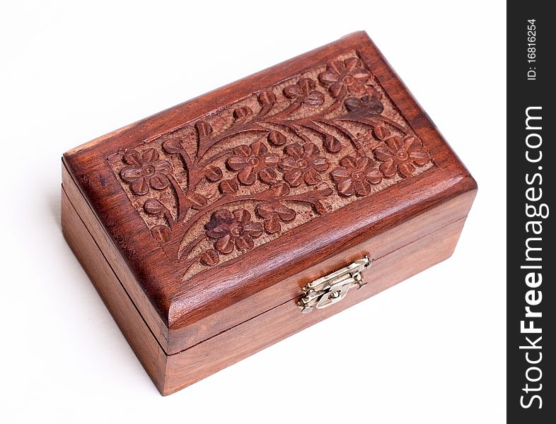 Carved wooden chest on white background, isolated