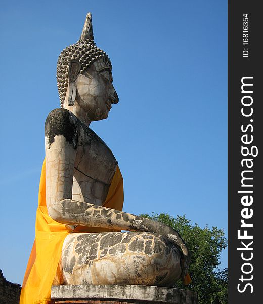 Side Profile Of A Buddha Statue.