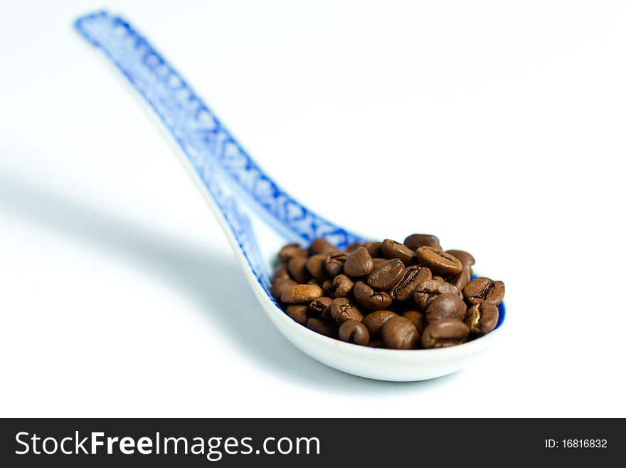 Coffebeans on a chineese spoon