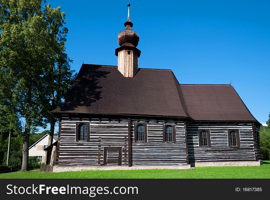 Old wooden church during the summer time.