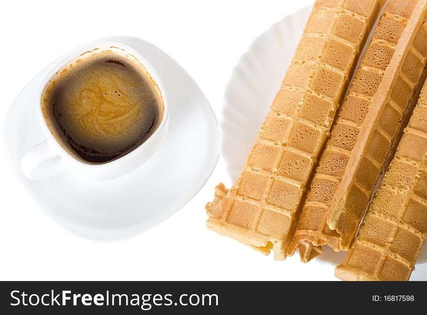 Close-up wafers and coffee, isolated on white