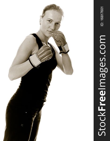 Beautiful girl with boxing gloves. Isolated.