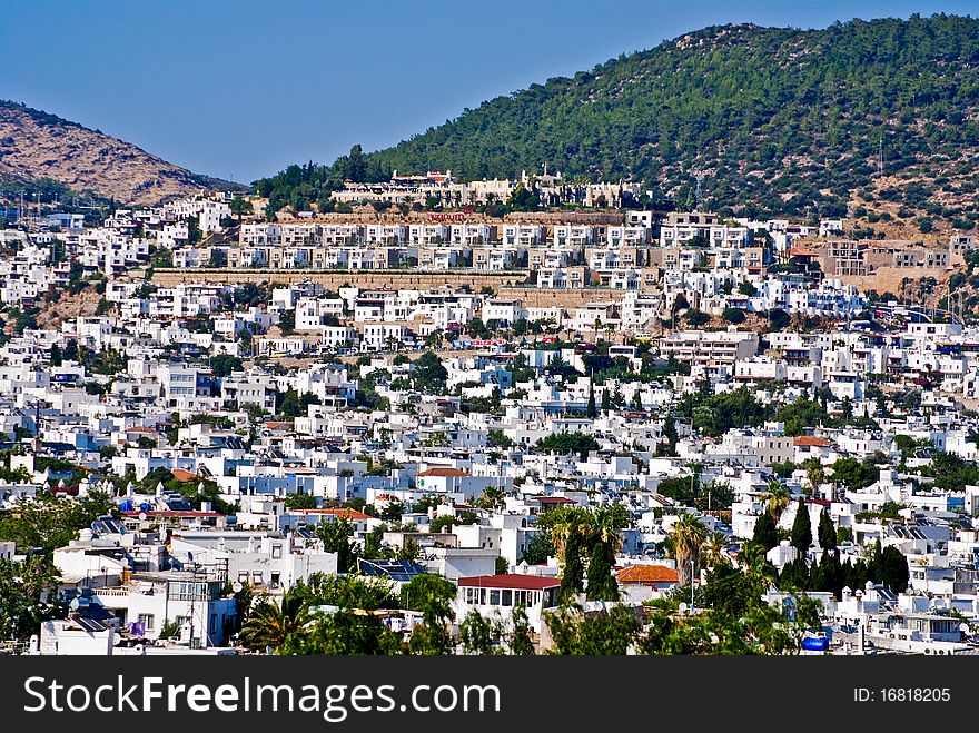 White summer houses in a luxury location on a hill. White summer houses in a luxury location on a hill