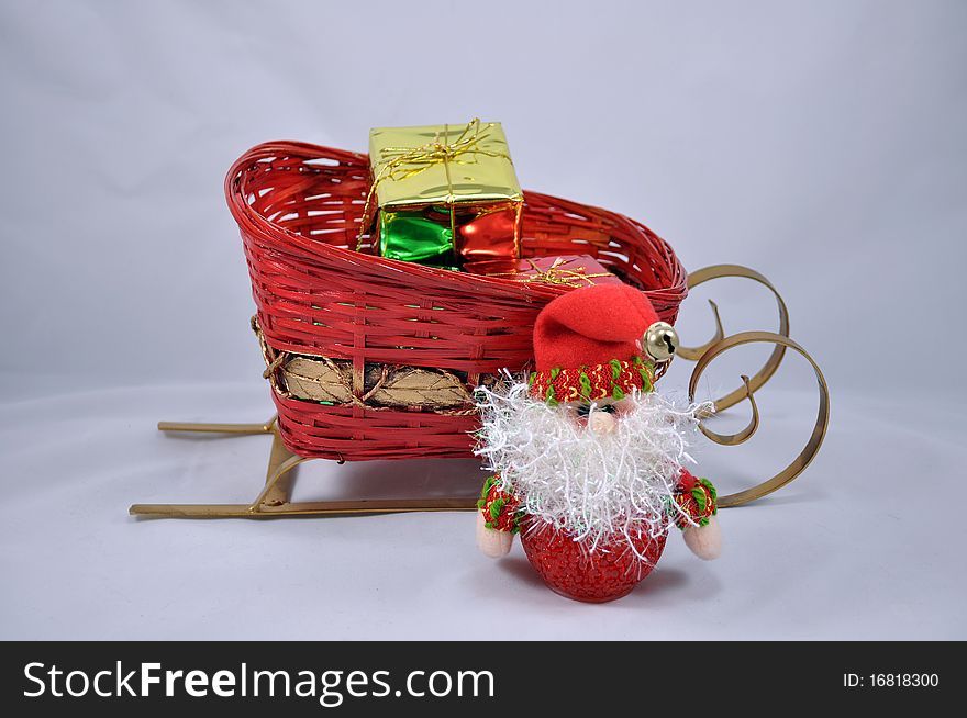 Small santa with sleigh and presents