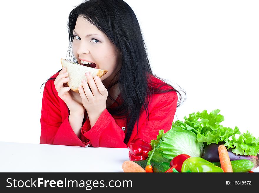 Beautiful woman  with vegetables over white background