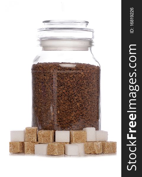 Jar of coffee with white and brown sugar