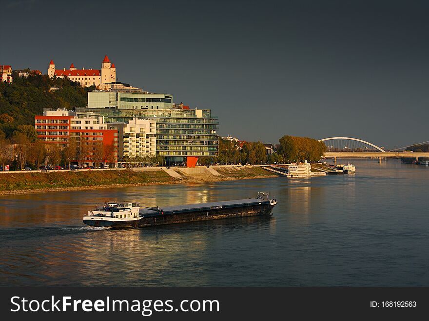 Danube embankment before storm, castle, river park, Bratislava, Slovakia.