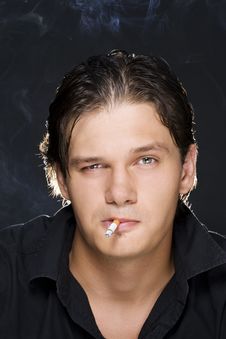 Man Smoking A Cigarette Stock Images