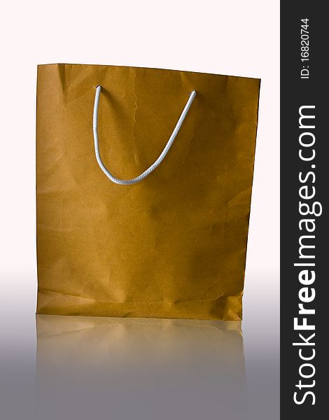 Brown paper bag isolated on white background