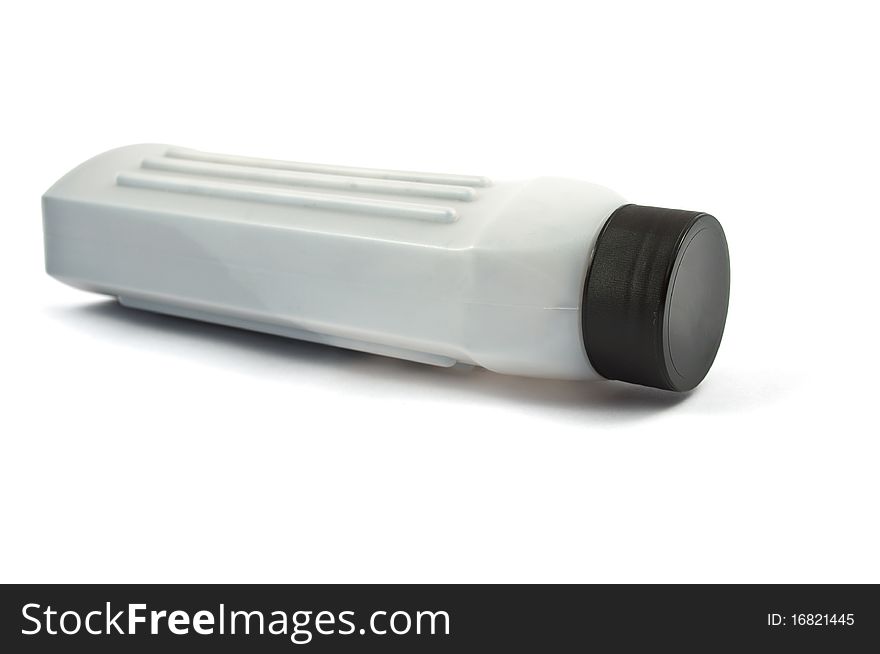 Bottle of toner on a white background