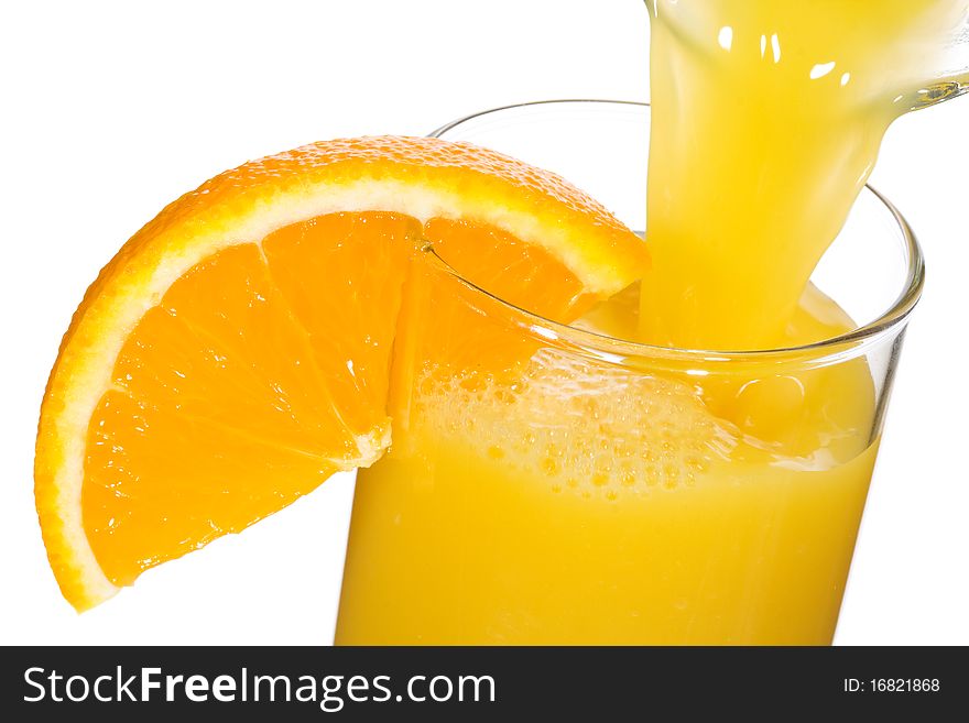 Orange juice with slice of orange on white background