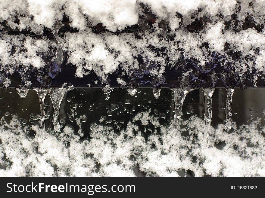 Icicles With Snow And Ice