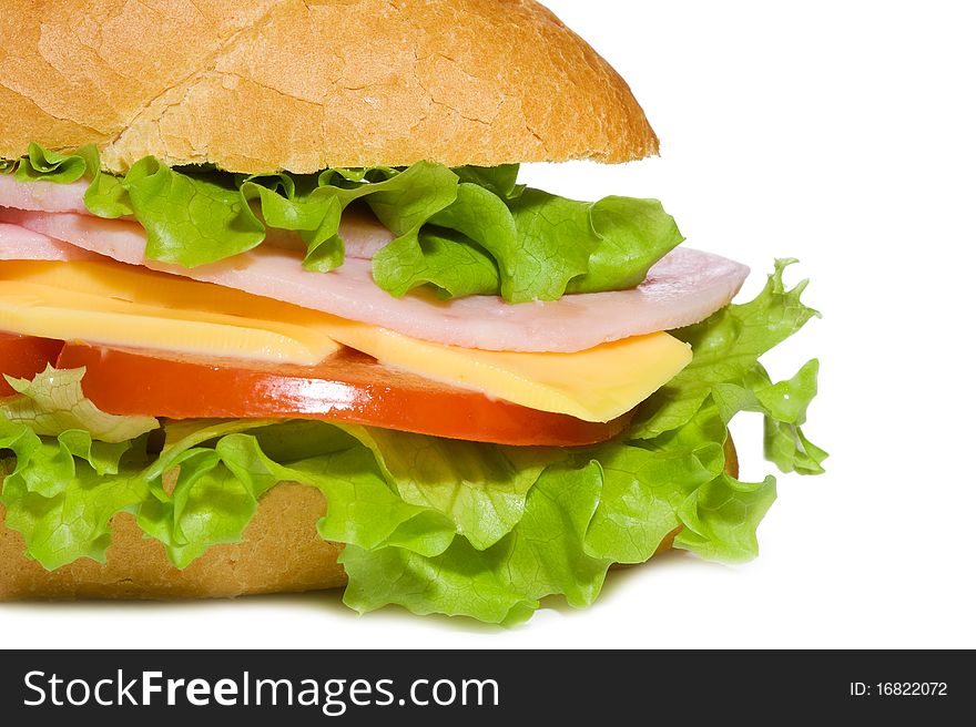 Sandwich with ham and vegetables on white background